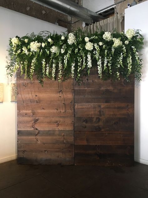 Rustic wood for a wedding ceremony backdrop or step and repeat with white and green flowers, lots of foliage, white hydrangea, roses and snapdragons Wedding Backdrop Ceremony, Flowers Wedding Ceremony, Cheap Wedding Flowers, Photo Backdrop Wedding, Garden Reception, Step And Repeat, White Hydrangeas, Wedding Ceremony Backdrop, Ceremony Flowers