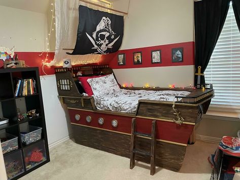 We Turned Our Son’s Race Car Bed Into A Pirate Ship Pirate Ship Bedroom, Ship Bed, Pirate Ship Bed, Pirate Bedding, Diy Pirate, Race Car Bed, Pirate Room, Perfect Roast, Car Bed