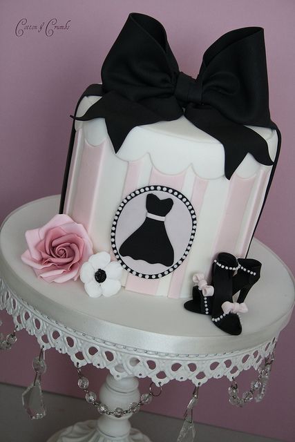 Another vintage ladies' hate box birthday cake, this time pale pink and white striped and tied with a big black bow. Logo design is of a classic 'little black dress' with matching edible little black heels next at the cake base. A pale pink rose completes the look. Cotton And Crumbs, Fashion Cake, Girly Cakes, Crazy Cakes, Fashion Cakes, Dress Cake, Unique Cakes, Gorgeous Cakes, Occasion Cakes