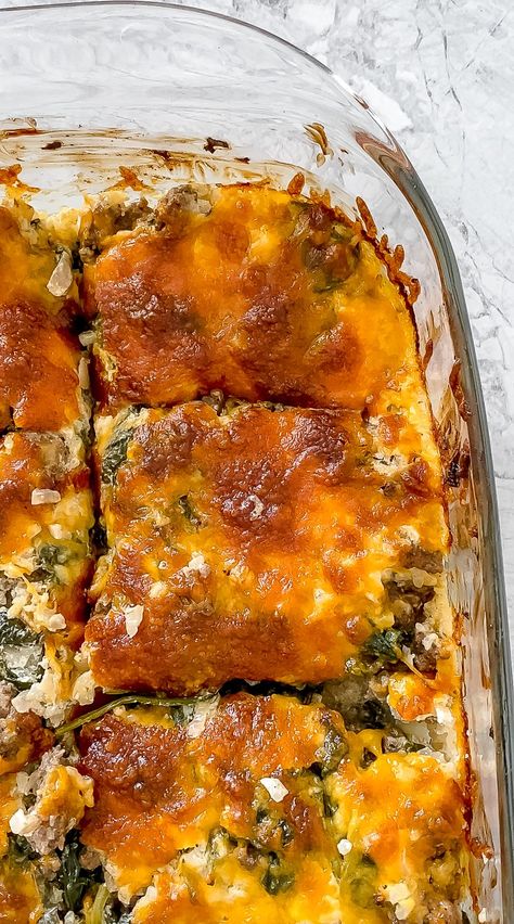 This Cheesy Ground Beef With Spinach And Cauliflower Rice Casserole is a 30-minute low-carb recipe that is a perfect choice for weeknight family dinners! The recipe is keto-friendly, gluten-free, nut-free, and requires straightforward ingredients that are readily available at most grocery stores. #realbalancedblog #groundbeefcasserole #lowcarbcasseroles Casserole With Cauliflower Rice, Casserole Dish Recipes, Rice And Spinach, Cauliflower Rice Casserole, Cheesy Ground Beef, Ground Beef Rice, Ground Beef Casserole Recipes, Rice Casserole Recipes, Cauliflower Rice Recipes