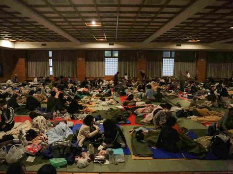 People sheltering at the evacuation center at the Mashiki Town Gymnasium feel the 7.0 magnitude earthquake that struck southern Japan a day after another earthquake in the same area killed nine people. Evacuation Center, Kumamoto, Japan, Feelings, Quick Saves