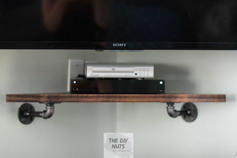 DIY Corner Shelf: How to design with a corner mounted tv? - The DIY Nuts Corner Tv Shelf Ideas, Corner Tv Shelf, Corner Mounted Tv, Corner Tv Mount, Rustic Centerpieces Diy, Diy Corner Shelf, Corner Shelf Ideas, Painted Fireplace, Tv Mounted