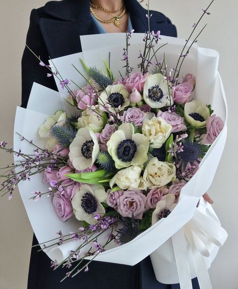 Anemones, double tulips, eryngium, purple spray roses and genista. Dahlia And Anemone Bouquet, Purple Anemone Bouquet, Anemone Floral Arrangements, Eryngium Bouquet, Anemone Flower Bouquet, Anemones Bouquet, Double Tulips, Anemone Bouquet, Mauve Wedding