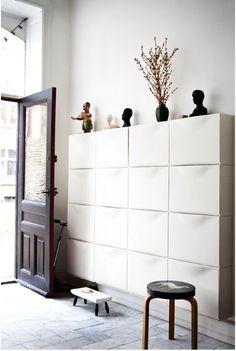 Storage can be more than functional.  A wall of TRONES shoe cabinets looks modern and sculptural in this entryway from blogger Henriette Wleth. Ikea Shoe Storage, Ikea Trones, Små Rum Lidt Plads, Vstupná Hala, Ikea Shoe, Hemma Diy, Ikea Storage, Shoe Storage Cabinet, White Cabinets