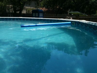 I have an above ground pool and keeping it clean is often difficult because there are trees hanging over it as you can see by the shade in the picture.  I have the pump nozzle set to make the water… Backyard Landscaping Pool, Skimmer Pool, Landscaping Pool, Pool Skimmers, Swimming Pool Maintenance, Pool Shade, Pool Hacks, Pool Skimmer, Intex Pool