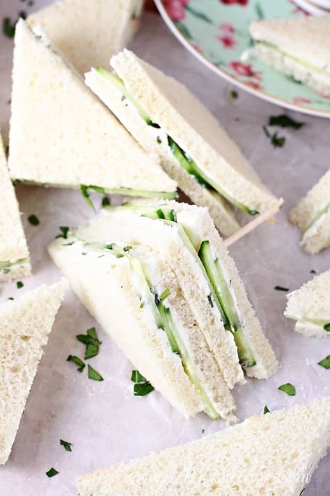 Cucumber Tea Sandwiches Recipe -- Herbed cream cheese is layered with thinly sliced cucumbers in these beautiful little sandwiches that are perfect for any special occasion, including Easter and Mother's Day. #cucumbers #sandwiches #teaparty Cream Cheese Tea Sandwiches, Cucumber Tea Sandwiches Recipes, Cheese Tea Sandwiches, English Tea Sandwiches, Cucumber Cream Cheese, Cucumber Sandwiches Recipes, Cheese Tea, Tea Party Menu, Cream Cheese Sandwiches