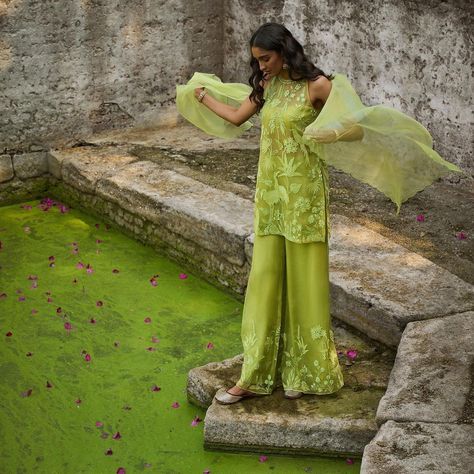 Anita Dongre on Instagram: “A mosaic of tropical joy unfolds on a backdrop of lush lime hue. This sleeveless silk kurta set depicts flamingo and magpie motifs using…” Cocktail Party Outfit Indian, Party Outfit Indian, Outfit Indian, Cocktail Party Outfit, Trendy Outfits Indian, Diwali Outfits, Indian Outfits Lehenga, Indian Fashion Trends, Anita Dongre