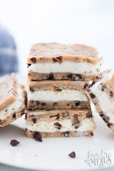 These delicious Cookie Dough Ice Cream Sandwiches have buttery chocolate chip cookie dough, layered with creamy vanilla ice cream. Buttery Chocolate Chip Cookies, Creamy Vanilla Ice Cream, Edible Chocolate Chip Cookie Dough, Chocolate Chip Cookie Dough Ice Cream, Homemade Ice Cream Sandwiches, Ice Cream Sandwiches Recipe, No Bake Cookie Dough, Raw Cookie Dough, Fresh Meals