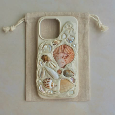 You can take the girl away from the beach but you can't take the beach away from the girl. Our Bespoke Coastal Case boasts a sheik sophisticated design whilst summer influences shine through, it is the ultimate vacation phone case. Our Coastal Case showcases more than 20 different variants of some of the most beautiful shells, pearls and echinoderms from the Victorian and Mediterranean coastlines- sustainably sourced, handmade and intricately aesthetically designed taking up to 3 hours per desig Textured Phone Case, Shell Aesthetic, Seashell Phone Case, Aesthetic Case, Beautiful Shells, Handmade Phone Case, Shell Crafts Diy, Pretty Phone Cases, Seashell Crafts