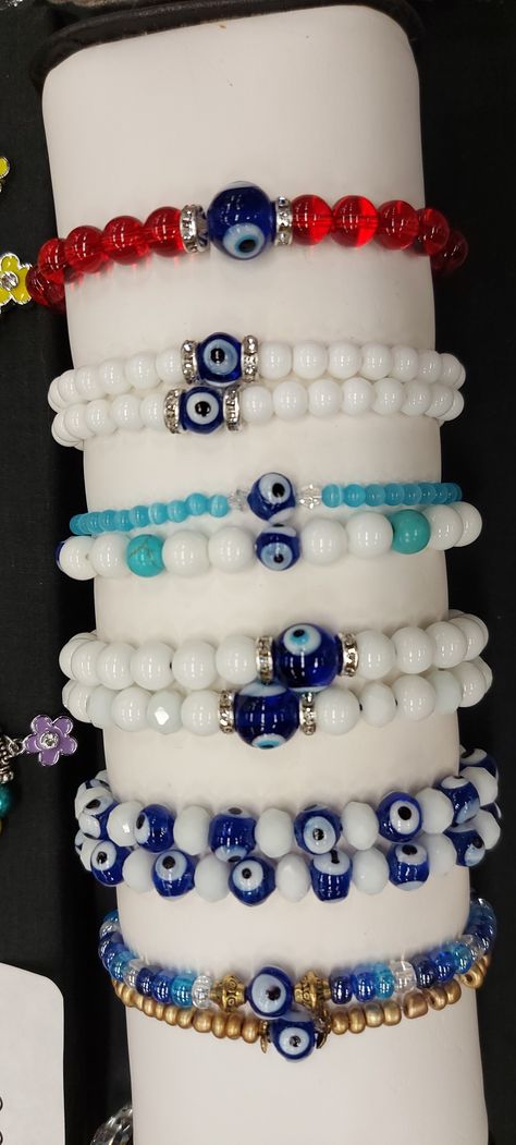 Handmade evil eye beads bracelets stack, made with white glass beads and blue evil eye glass beads with zircon spacers https://www.facebook.com/Bella-Jewelry-Shop-1217177241666922/ Turquoise Bead Jewelry, Turquoise Dream Catcher, Handmade Evil Eye, Lava Stone Bracelet, Wood Bead Bracelet, Crystal Angels, Wood Bracelet, Blue Evil Eye, Turquoise Pendant