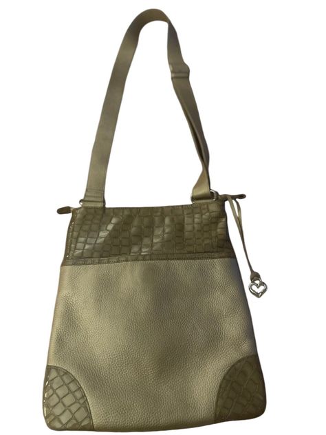 This Brighton handbag is a stylish crossbody shoulder bag in a luxurious gold faux croc embossed leather. It is an original piece from Brighton and features a classic design suitable for everyday use. Crafted in China, this shoulder bag exudes a timeless appeal with its elegant color and material, making it a versatile accessory for adult unisex individuals. Brighton Handbags, Elegant Color, Vintage Accessories, Crossbody Shoulder Bag, Embossed Leather, Cross Body Handbags, Emboss, Brighton, Classic Design