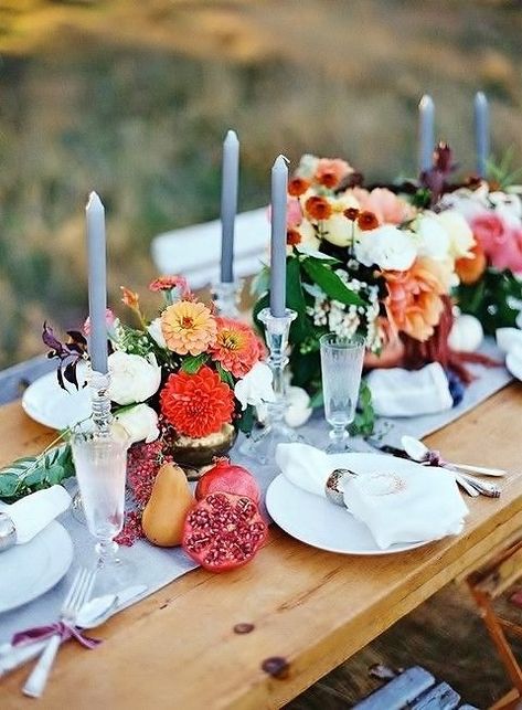 These cheery and unique tables prove that a mix of surprising elements and conventional touches is key to creating the perfect Thanksgiving tablescape. #thanksgiving #thanksgivingdecorations Fall Wedding Tablescapes, Driftwood Centerpiece, Red Centerpieces, Autumn Bridal, Fall Wedding Photos, Unique Thanksgiving, Bridal Bouquet Fall, Fall Wedding Centerpieces, Rustic Fall Wedding