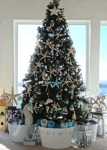 christmas decorations with seashells | grand Christmas Holiday tree in a Tiny Cottage in Coastal California ... Seaside Christmas Decor, Ocean Christmas Tree, Ocean Themed Christmas Tree, Under The Sea Christmas Tree, Alaska Christmas, Beach Christmas Tree, Beach Trees, Shark Christmas, Theme Tree