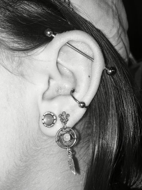 Industrial and conch piercings Conch Industrial Piercing, Industrial And Conch Piercing, Conch And Industrial Piercing, Lot Of Ear Piercings, Industrial Piercing Aesthetic, Ear Mapping, Earring Aesthetic, Double Ear Piercing, Different Ear Piercings