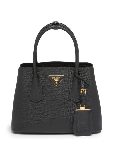 Prada Saffiano Tote bag Includes: Guarantee card, booklet, barcode tag Exterior Material: Leather Hardware: Gold Tone To order visit :theluxurycloset https://invol.co/cljwmwb In the improbable scenario of a sale of an inauthentic item, you will receive a 100% refund. Minimalist Logos, Hardware Logo, Black Leather Tote Bag, Personal Chef, Prada Saffiano, Bread And Butter, The Double, Minimalist Logo, Women Perfume