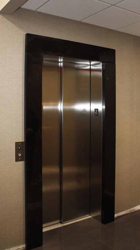 A great LULA installation in Hamilton, Ontario. Lift Lobby Design Residential, Lift Wall Cladding Design, Lift Cladding, Lobby Design Residential, Lift Wall, Lift Lobby Design, Elevator Lobby Design, Wall Cladding Designs, Stone Door