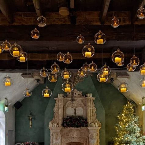 Northumbrian Flowers on Instagram: "Almost two years since I last put my bauble canopy up at @lepetitchateauweddings. This was done on Monday, it is now down and put away but its going back up next Monday! It is perfect for those winter weddings, harry potter fans and especially at Christmas  Available to hire for your winter wedding at @lepetitchateauweddings get in touch to check availability and prices  #somethingdifferent #harrypotterstyle #'hangingbauble #winterwedding #weddingsinnorthumberland #northumberlandweddingflorist #ceremonygoals #candlelitwedding  #christmaswedding #tagmoments" Harry Potter Christmas Wedding, Harry Potter Winter Wedding, Harry Potter Wedding Decorations, Harry Potter Flowers, Floating Lights Harry Potter, Harry Potter Chirstmas Theme Weddin, Harry Potter Christmas Baubles, Candle Lit Wedding, Bouquet Gift