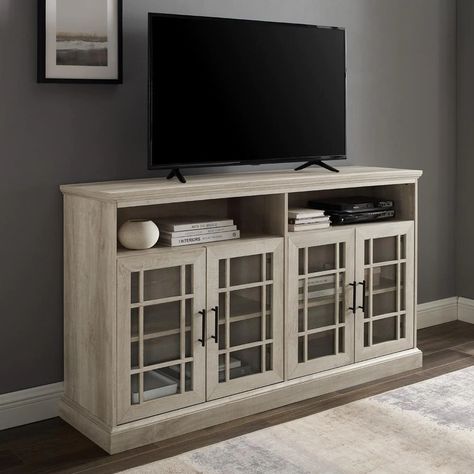 With all the flair of a traditional English manor, this sideboard maintains a stately presence without getting stuffy. This storage console can be used as a kitchen credenza where you can keep your cookbooks Kitchen Credenza, Tall Tv Stands, Living Room Storage Cabinet, Rustic Tv Stand, Storage Console, Flat Panel Tv, Party Dishes, English Manor, Walker Edison