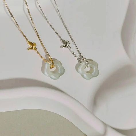 Elevate your style with the delicate beauty of our Butterfly Flower Shape Hetian Jade Pendant Necklace. A timeless piece for any occasion. 💚✨ #HetianJade #ButterflyJewelry #FloralElegance #ElegantStyle #JadeJewelry #JadeNecklace #SterlingSilver #22K Jade Pendant Necklace, Hetian Jade, Delicate Beauty, Butterfly Flower, Jade Necklace, Butterfly Jewelry, Jade Jewelry, Butterfly Flowers, Jade Pendant