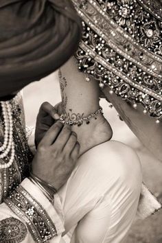 love this shot of the groom dressing his bride in payal! Wedding Photo Checklist, Babies Pics, Arizona Wedding Venues, Big Fat Indian Wedding, Indian Wedding Photos, Punjabi Wedding, Desi Wedding, Hindu Wedding, Indian Wedding Photography