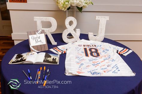 Chicago Bears Wedding, Football Jersey Guest Book - Plan It Events - Orlando Wedding Planner | Orange & Blue Wedding, Sports Wedding | Steven Miller Photography Football Guest Book, Jersey Guest Book Weddings, Football Themed Wedding Reception, Football Wedding Favors, Chicago Bears Wedding Theme, Steelers Wedding, Orange Blue Wedding, Football Wedding Theme, Sports Themed Wedding