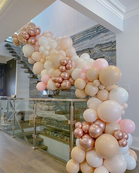 Simply beautiful! 🎈 This soft-colored balloon garland decorates the stairs with a gentle, pretty touch that catches your eye. Explore more magical party ideas! ✨ Visit our website – link in bio! 👆Subscribe and get 20% OFF on your first order! . . . #torontoballoons #gtaballoons #gtaballoonsdelivery #kleinburgballoons #mississaugaballoons #northyorkballoons #mississaugamoms #torontomoms #richmondhillmoms #balloonbunches #balloongarland #organicballoons #globosorganicos #guirnaldadeglobos #gu... Pink White And Gold Balloon Garland, White Gold Pink Balloon Garland, Pink And Gold White Balloon Arch, Pink White Golden Balloons Decoration, Pink Golden Balloons Decoration, Pink And White Balloons, Magical Party, White Balloons, Website Link