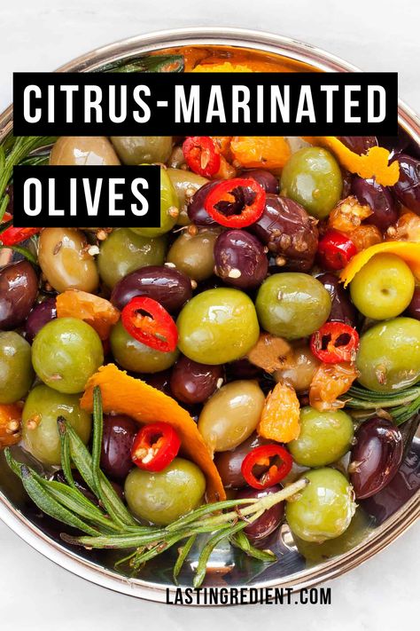 I default to making things from scratch, but every now and then I love fancying up store-bought food. For these citrus-marinated olives, I scooped up a mix including Kalamata, Picholine, Castelvetrano, Nicoise and Cerignola olives. #holidaypartyfood #snacks #starters Marinated Cheese, Pickled Olives, Olive Brine, Marinated Olives, Olive Recipes, Best Appetizers, Making Things, Greek Recipes, Now And Then