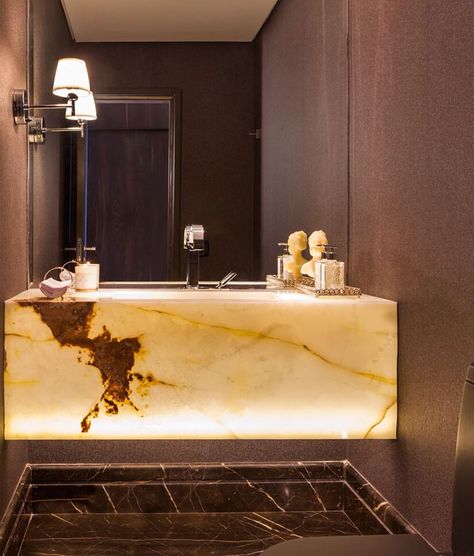 This high-end bathroom vanity uses backlit onyx to create a statement. Notice how the surrounding walls have a simple style to not overwhelm the interior design. Architecture Bathroom, Powder Room Design, Contemporary Bathrooms, Marble Bathroom, Bath Tub, Bath Design, Beautiful Bathrooms, Contemporary Bathroom, Black Walls