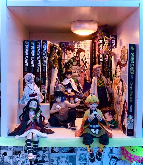 volumes 1-4, 21-23, 1 manga extra (stories of water and flame), 2 fan books, and 3 light novels and figures Manga Collection Display, Demon Slayer Collection, Demon Slayer Manga Collection, Anime Collection Room, Anime Figure Shelf, Anime Room Design, Anime Figures Collection Display, Shelving Manga, Manga Shelf Ideas