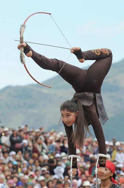 World Nomad Games Pencak Silat, Traditional Archery, Yoga Photography, Dynamic Poses, Action Poses, People Of The World, Archery, Traditional Dresses, Yoga Poses