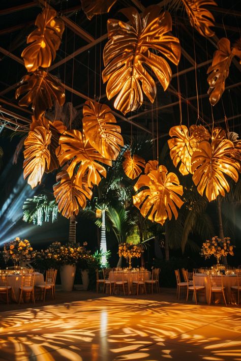 Tropical Dance Floor Decor: Gilded Leaves & Twinkling Lights for an Enchanting Night - Dance Floor Ceiling Installation Ideas Tropical Night, Wedding Installations, Cocktail Style Reception, Tropical Dance Floor, Candle Wall Wedding, Tropical Glam Wedding Decor, Tropical Wedding Lighting, Tropical Ballroom Wedding, Tropical Hanging Installation