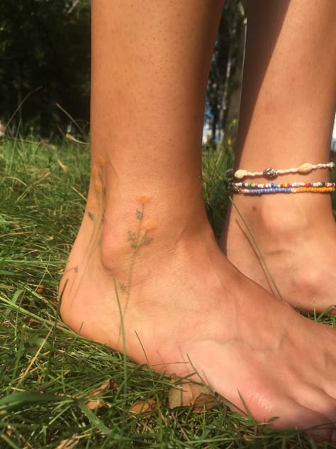 Sustainable Tattoo Ideas, Light Pink Tattoo Ink, Ankle Flowers Tattoo, Peach Pit Tattoo, Colorful Small Tattoos, Pink Symbolism, Foot Flower Tattoos, Granola Tattoo Ideas, Alex G Tattoo