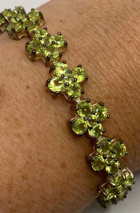 This Peridot bracelet is very lively and bright.  The stones are deep colors and well matched.  The silver is oxidized from age and can be re polished for you.  7.5 inches My jeweler can shorten it and he charges a $20 fee All jewelry is shipped in a nice gift box.   Check out our over a THOUSAND great reviews Engraving is $4 per letter and is not always perfect depending on the piece. It can take a few days if the jeweler is busy. This is payable to Paypal Judithsltd@gmail.com Marcasite Bracelet, Silver Tennis Bracelet, Peridot Bracelet, Peridot Jewelry, Lock Style, Green Peridot, Deep Colors, Tennis Bracelet, Chain Link Bracelet