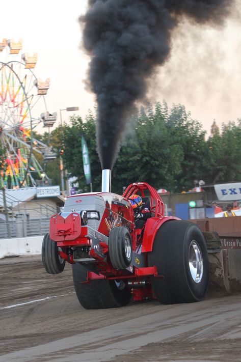 Smoke stack tractor pull #stancofair Pulling Trucks, Tractor Pulls, Truck Pulling, Rolling Coal, Truck And Tractor Pull, Pulling Tractors, Truck Pulls, Tractor Pulling, Red Tractor