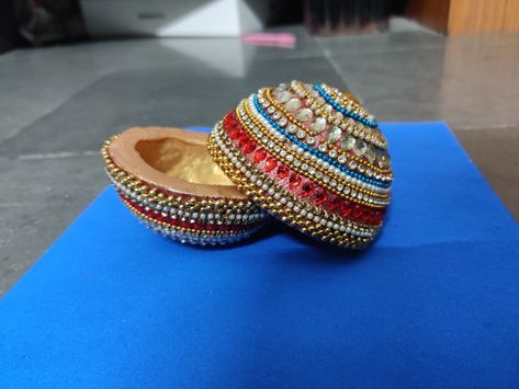 Kudukalu decoration for marriage or any events Elephant Hair Jewelry, Decoration Things, Kalash Decoration, Lengha Blouse, Ganpati Decor, Coconut Decoration, Elephant Hair, Kundan Rangoli, Thali Decoration