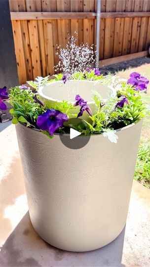 3.1K views · 1.4K reactions | DIY water fountain ⛲️ I’ve been wanting to create one of these for a while but couldn’t find any planters I loved, until I found these beauties at Target. 😍

All you need are two planters, soil, flowers, and a solar fountain pump! 

Comment “OUTDOOR” and I’ll send you links to everything I used!
•
•
•
•
#outdoorspace #backyardoasis #backyarddesign #outdoordecoration #patiodecor #porchdecor #outdoorliving #outdoordiy #easydiy #diydecoration
#patiopond #patioproject #patiofurniture #summerproject #diyhomeimprovement #diyhacks #diyhomedecor #diywaterfountain #diyhomeprojects #homeimprovement #homehacks #neutralhomedecor #projectsinaday #dayproject #modernfarmhouse #mycozystyledhome 
#farmhousefanatics #mystyleoffarmhouse #ltkhomedecor #outdoorproject
home decor, Planter Fountain, Fountain Diy, Summer Outdoor Decor, Patio Pond, Diy Water Fountain, Patio Projects, Solar Fountain, Fountain Pump, Cinnamon Recipes