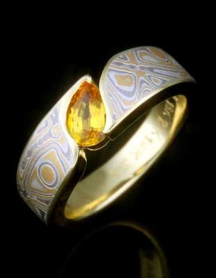 Mokume Wave Engagement Ring with a pear cut yellow sapphire in our Summer Mokume. Solitare Engagement Rings, Couple Ring Design, Favorite Engagement Rings, Shiny Rings, Popular Engagement Rings, Engagement Rings Affordable, Mokume Gane, Fancy Rings, Sapphire Solitaire