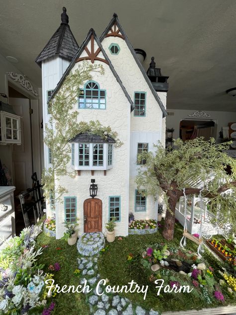 1:12 scale Dollhouse, Originally the Crest View and manufactured by Duracraft, completely renovated into a French Country Cottage/Manor. If you want to follow more, you can find this house on Instagram @mom_bun_miniatures Dollhouse Landscaping, Country Dollhouse, Dollhouse Exterior, French Doll House, Large Dolls House, House Decorating Ideas Apartments, Dollhouse Garden, Doll House Plans, Doll House Crafts