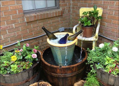 DIY Wine Bottle Fountain Wine Bottle Fountain, Bottle Fountain, Homemade Water Fountains, Patio Fountain, Water Fountain Design, Diy Water Feature, Taman Air, Diy Water Fountain, Fountains Backyard