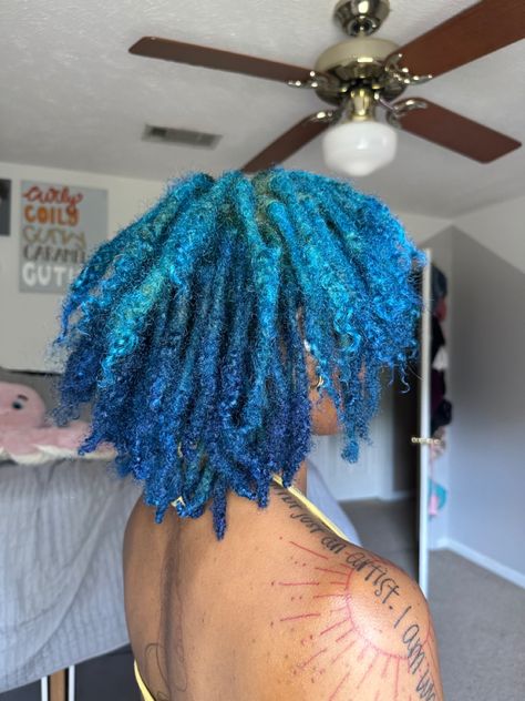 blue locs, dyed locs Blue Peekaboo Locs, Dark Blue Locs Black Women, Blue Dyed Locs, Pink And Blue Locs, Blue Dreads Black Women, Hair Color Ideas For Locs, Blue And Green Locs, Blue And Purple Locs, Loc Hair Colors