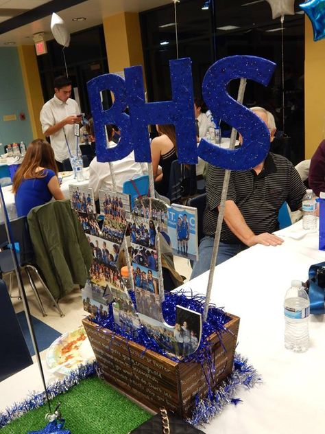 My favorite centerpiece at our 2016 BHS XC banquet. wonderful piece by a runner's sister. Cross Country Table Centerpieces, Running Centerpiece Ideas, Cross Country Centerpiece Ideas, Cross Country Banquet Decorations, Cross Country Banquet Centerpieces, Track Banquet Centerpieces, Sports Banquet Centerpieces Cross Country, Cross Country Decorations, Sports Banquet Centerpieces