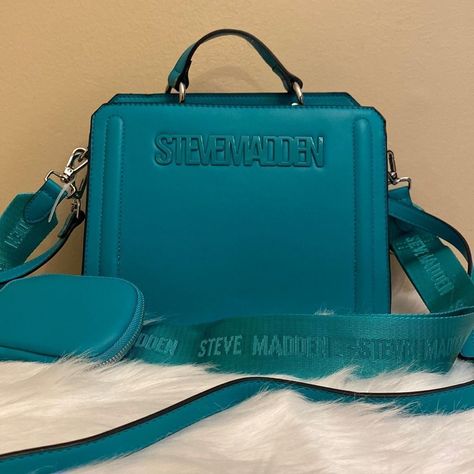 Nwt Steve Madden Bevelyn Viral Tiktok Bag Color: Turquoise Tiktok Viral Bag Silver Tone Hardware Airpod Pouch Interior Zipper And Slip Pocket Snap Closure Compartment Has Two Slip Pockets Zippered Compartment Has A Zipper Pocket Guitar Strap With Steve Madden Logo Can Be Worn Three Different Ways! Approximately 9" 8" X 4" Category Steve Madden Crossbody Tiktok Steve Madden Bags Handbags, Steve Madden Bevelyn, Fanny Pack Purse, Trendy Purses, Steve Madden Purse, White Crossbody Bag, Steve Madden Handbags, Pink Crossbody Bag, Faux Leather Purse