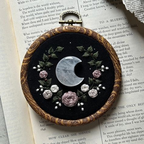 Hand drawn and hand embroidered using DMC thread and has a quartz crystal moon. Stitched on felt backing.  Hoop is made of plastic and has an imitation wood look with a brass ring for hanging.  Approx. Frame size: 4 inches x 4 inches Whimsigoth Embroidery, Witchy Embroidery Ideas, Moon Sewing Pattern, Door Tapestry, Chair Embroidery, Moon Embroidery Pattern, Witchy Embroidery, Key Embroidery, Artwork Inspiration