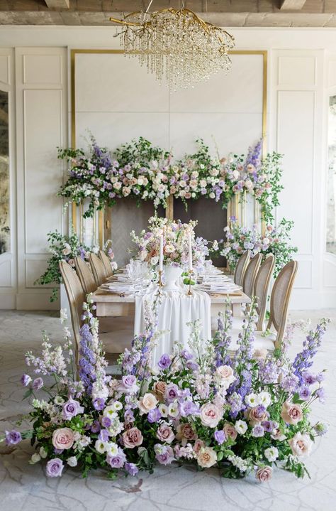 Read More: https://www.stylemepretty.com/2021/08/27/the-loveliest-explosion-of-lilac-and-lavender/ Lilac Wedding Themes, Chiffon Table Runner, Lavender Wedding Theme, Lilac Wedding, Pastel Wedding, Lavender Wedding, Whimsical Wedding, Wedding Flower Arrangements, Wedding Mood