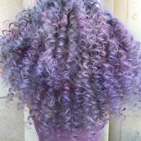 Purple curly hair Periwinkle Curly Hair, Lilac Hair Curly, Curly Purple Hair Black Women, Pastel Purple Curly Hair, Lavender Curly Hair Black Women, Curly Pastel Hair, Vivid Curly Hair, Ash Mauve Hair, Lavender Hair Curly