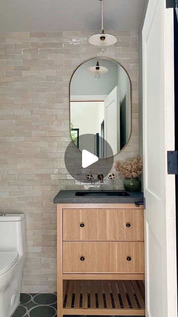 Lisa Kanegae on Instagram: "💫 Comment TILE and I’ll send you the link for this tile we used in this bathroom. Must be following me or the automation gets blocked.

We saved so much money not having to buy a whole slab for our small vanity. Genius hack for a cost effective bath Reno! This tile is 24”x48”  and was perfect size. It’s about half an inch thick so durable enough to use on a countertop.  Use at your own discretion but it’s been three years and it’s held up awesome! Also linked some of my other bath favorites

#bathroomremodel #bathroomdesign #bathreno #interiordesigntips" Small Vanity, Interior Design Tips, Bathrooms Remodel, Bathroom Design, Reno, Countertops, Tile, Vanity, Bath