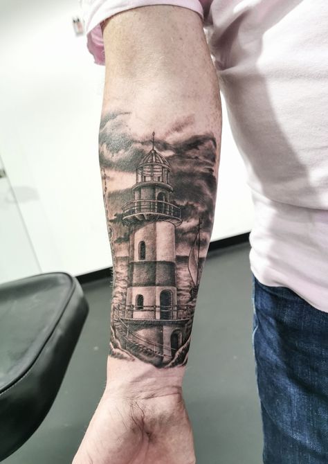 Black and Gray Lighthouse Tattoo Black And Gray Lighthouse Tattoo, Lighthouse Tattoo Men, Lighthouse Tattoo, Upper Arms, Black And Gray, Arm Tattoo, Tattoos For Guys, Geometric Tattoo, Lighthouse