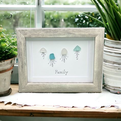 Sea Glass Art Family Present| Friendship Seaglass Jellyfish Framed Art Gift This Listing Includes: *Beautiful Sea Glass Art As Pictured *Genuine Sea Glass Used In Each Piece *Perfect Gift For A Birthday Or Holiday! *Original Minimalist Design Printed On Card Stock Paper With Sea Glass Attached * High Quality 5x7 Compostite Shadowbox Frame *Real Glass Front *Frame Available In Wood Grain, White Or Black *Bevel Cut Mat *Frame Depth Is 1.5 Inches And Stands Alone Or Can Be Hung *Note Included About Unique Jellyfish, Sea Glass Wedding, Sea Glass Artwork, Sea Glass Art Diy, Sea Glass Art Projects, Beach Glass Crafts, Present For Birthday, Jellyfish Art, Family Presents