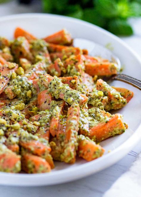 These Carrots with Pistachio Herb Butter get crunch appeal from pistachios sprinkled on top and in a wonderful lime and mint butter. It’s the unexpected pop of freshness in the herb butter coat them that makes this special. A tasty side dish that is a new house favorite. www.keviniscooking.com Mint Butter, Tasty Vegetables, Pistachio Recipes, Sauteed Carrots, Butter Mints, Healthy Fall, Special A, Thanksgiving Sides, Herb Butter