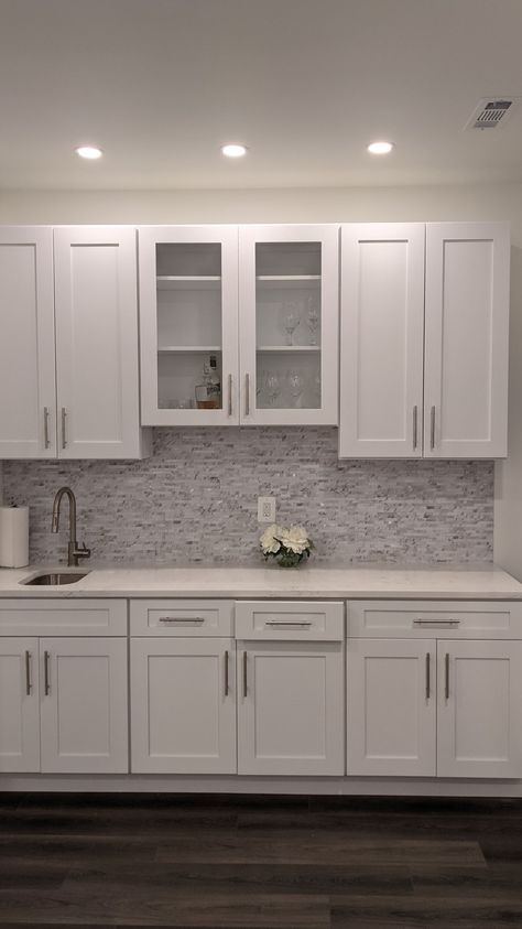 Basement Wet Bar White Cabinets, White Wet Bar Basement, White Cabinet Wet Bar Ideas, White Cabinets Basement Bar, White Cabinet Basement Bar, Basement Bar With White Cabinets, White Cabinet Wet Bar, White Basement Kitchenette, Basement Bar Ideas White Cabinets